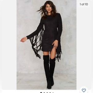 Polyester faux Suede fringe dress.